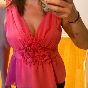pink v-neck sheer sleeveless blouse